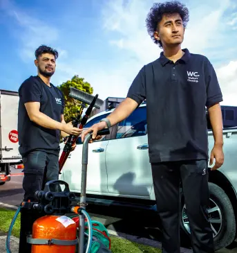Walkers Cleaning team members with commercial cleaning equipment ready for professional service in Sydney